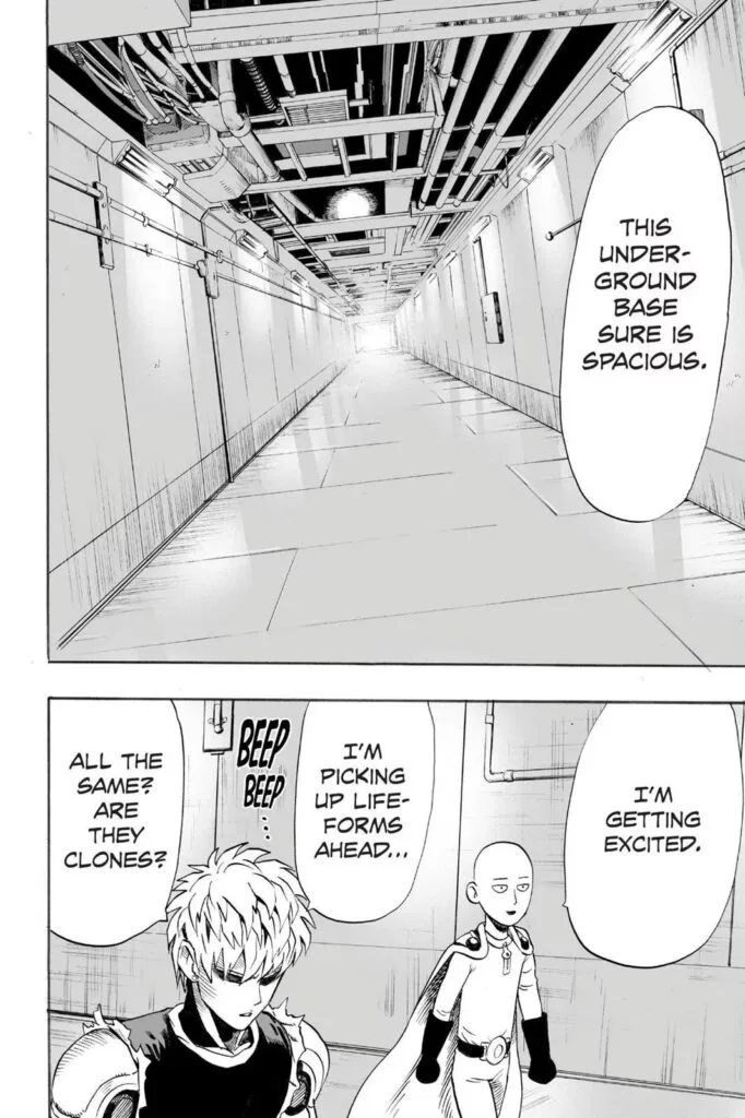 Serious Genos and carefree-looking Saitama walking in an empty hallway.