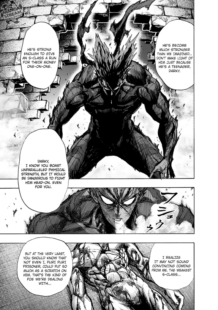 Garou stands menacing and breathes smoke while his eyes are glaring at the injured Puri-Puri Prisoner.