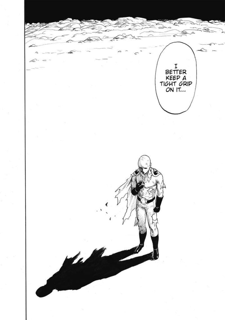 Saitama decides to hold Genos' core as he stands with shadow casting on his front.
