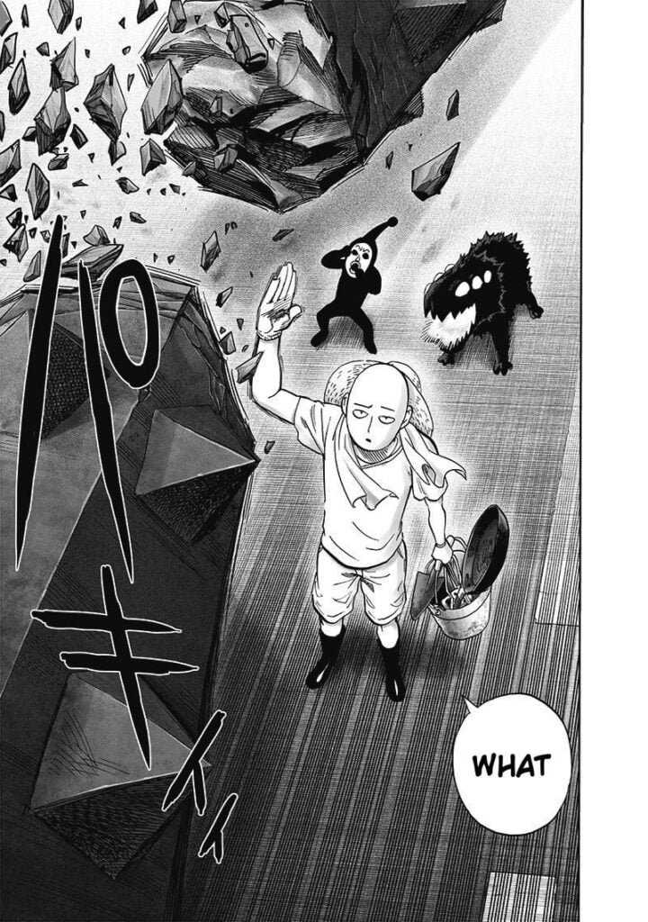 The robot's arm breaks after Saitama blocks the attack.