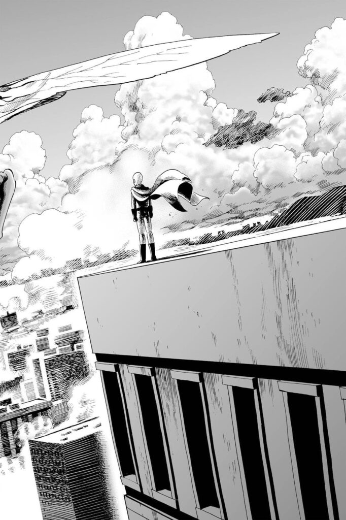 Saitama stands atop a building while his cape dances as the wind blows.