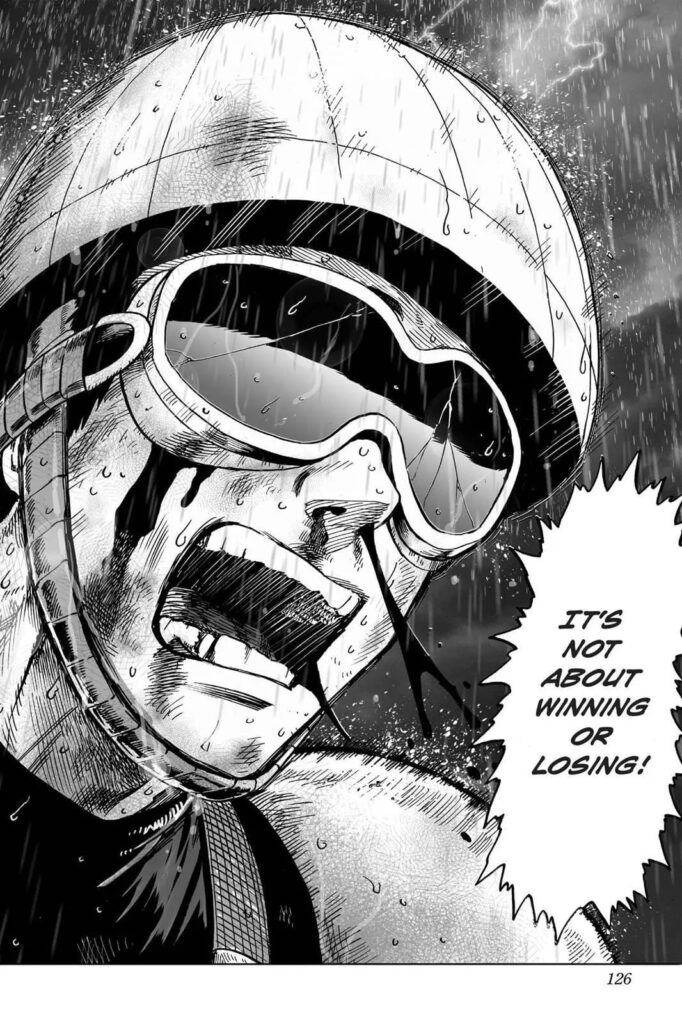 Mumen Rider's face gets bloody under the rain's downpour.