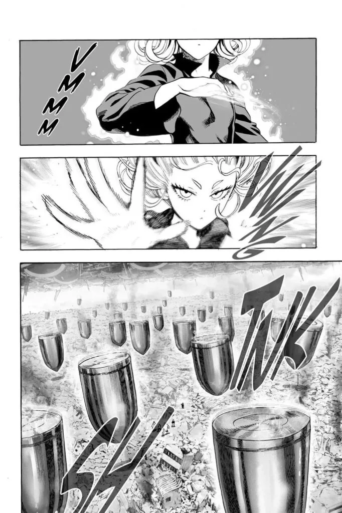 Tatsumaki releases her power and stops the bullets in midair.