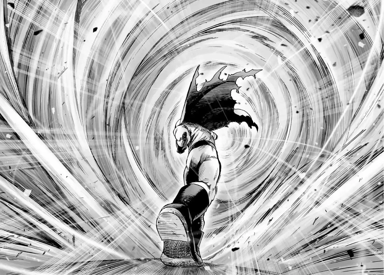 The powerful energy attack slowly splits into two as Saitama punches it.