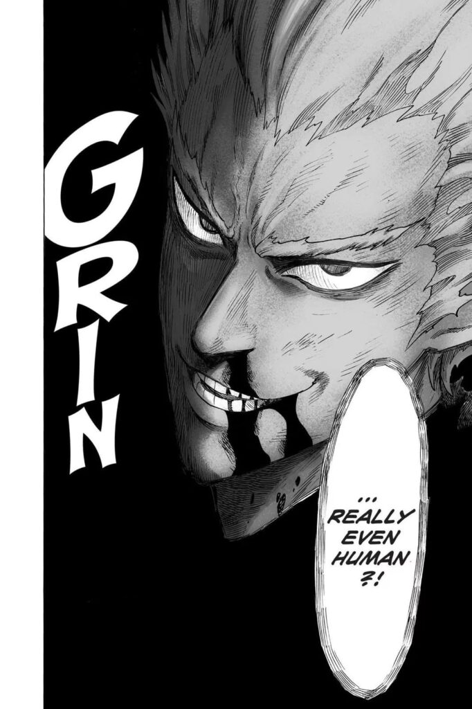 Garou grins while his nose bleeds.