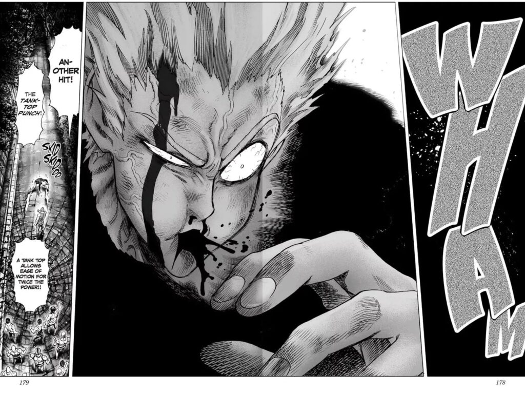 Garou coughs blood after getting hit by Tank-top Master's "Tank-top Punch".