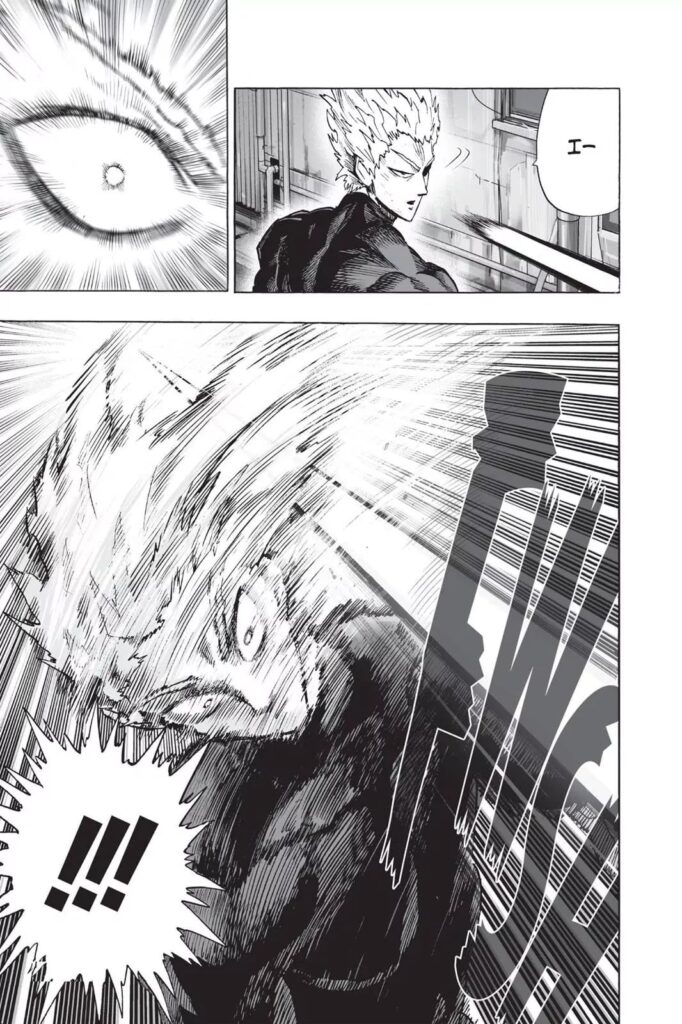 Garou turns his head and sees an attack but dodges it.